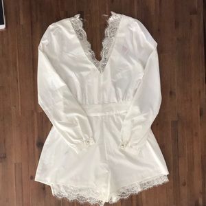 White Long Sleeve Romper with Lace Embellishment